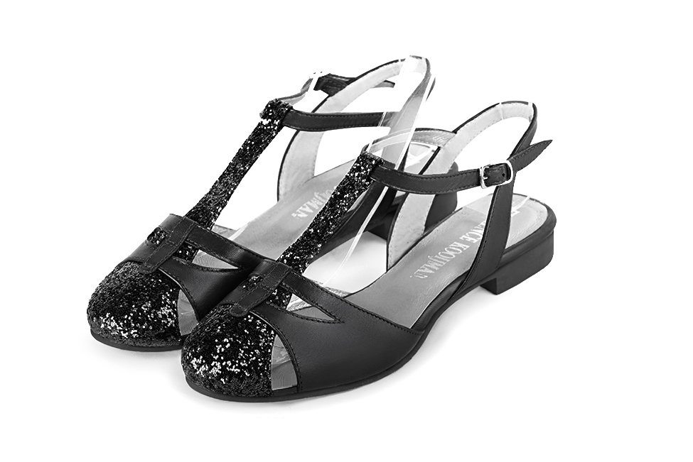 Gloss black women's open back T-strap shoes. Round toe. Flat leather soles. Front view - Florence KOOIJMAN